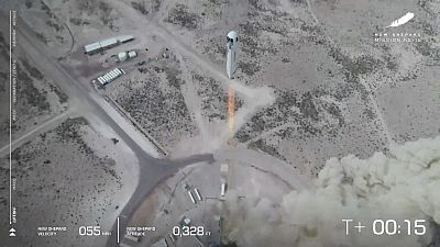 In this image from video made available by Blue Origin, the New Shepard rocket lifts off during a test in West Texas on Wednesday, April 14, 2021.