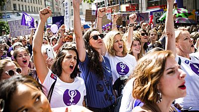 Swiss women take part in a nationwide general strike against working conditions in June 2019.