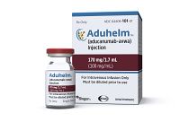 This image provided by Biogen on Monday, June 7, 2021 shows a vial and packaging for the drug Aduhelm