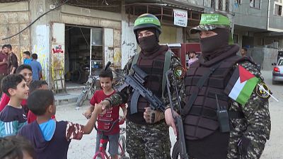 Members of the Ezzedine al-Qassam Brigades, armed wing of the Palestinian Hamas movement, parading in Gaza City
