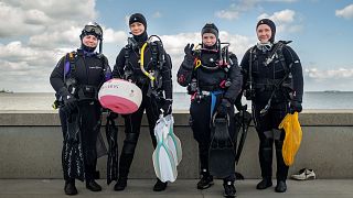 The volunteers regularly find discarded scooters in the water