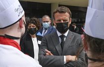 FILE: French President Emmanuel Macron talks with cooking students, Tuesday June 8, 2021 at the Hospitality school in Tain-l'Hermitage, southeastern France.