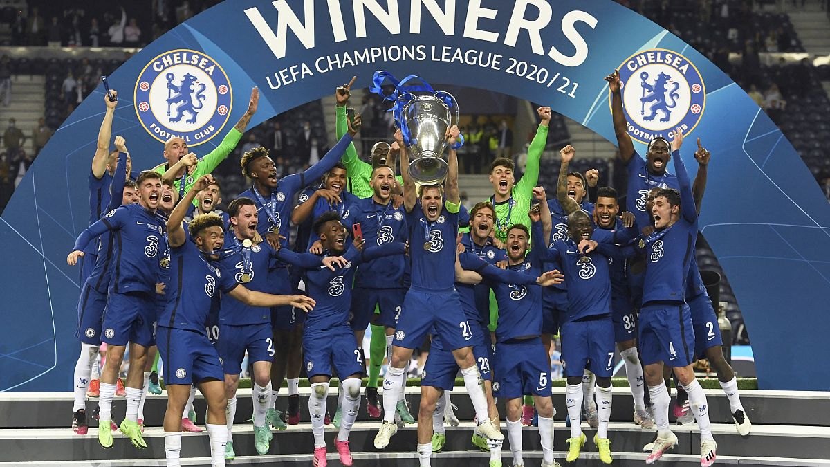 Chelsea's team captain Cesar Azpilicueta lifts the trophy at the end of the Champions League final match between Manchester City and Chelsea,  in Porto, Portugal, May 29, 2021