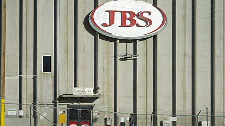 A worker heads into the JBS meatpacking plant in Greeley, Colorado, US.