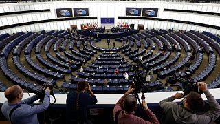 Reporters film European Parliament President David Sassoli officially opening a session in Strasbourg, eastern France, June 7, 2021. 