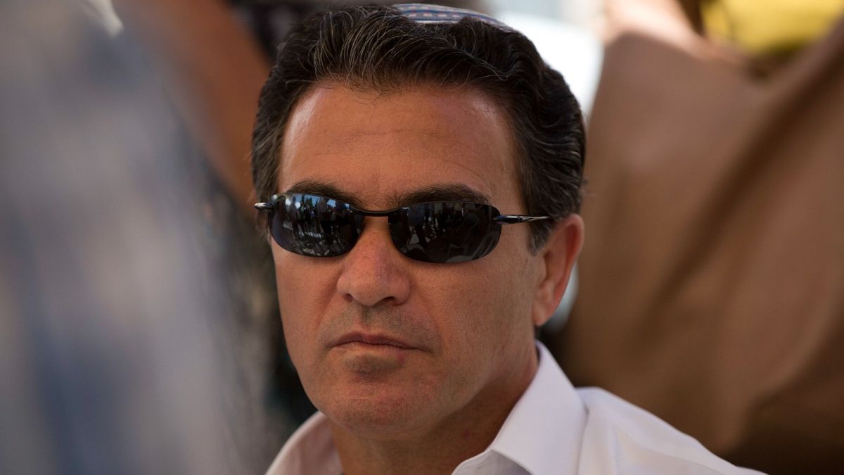 Yossi Cohen, then the director of Israel's Mossad intelligence agency, attends the funeral in Jerusalem of a rabbi killed by Palestinian gunmen on June 10