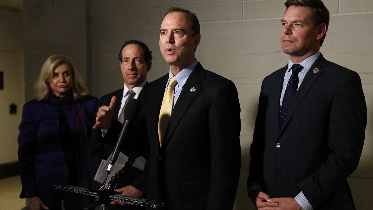 In this May 28, 2019 file photo, Rep. Adam Schiff, D-Calif., centre, and Rep. Eric Swalwell, D-Calif., right, speak with members of the media on Capitol Hill in Washington. 