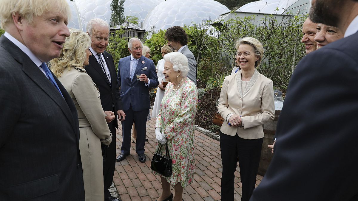 Britain's Queen Elizabeth II with US President Joe Biden and his wife Jill Biden during a reception with G7 leaders at the Eden Project in Cornwall, England, June 11, 2021.