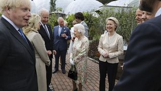 Britain's Queen Elizabeth II with US President Joe Biden and his wife Jill Biden during a reception with G7 leaders at the Eden Project in Cornwall, England, June 11, 2021.