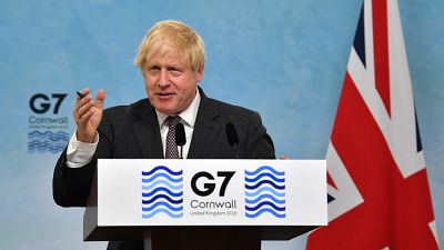 Britain's Prime Minister Boris Johnson takes part in a press conference on the final day of the G7 summit in Carbis Bay, Cornwall on June 13, 2021.