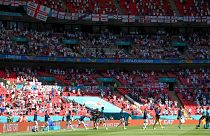 Players enter the pitch to play the Euro 2020 soccer championship group D match between England and Croatia, at Wembley stadium, London, Sunday, June 13, 2021