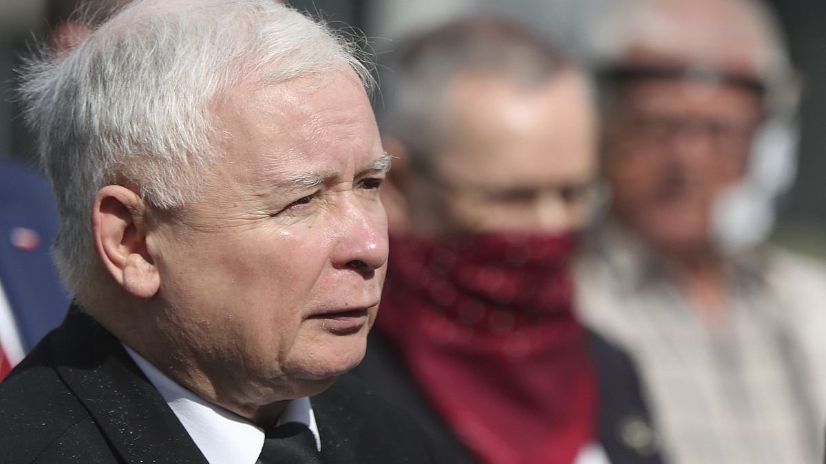 Poland's ruling party leader Jaroslaw Kaczynski attends a police-guarded ceremony in Warsaw.