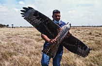 One of the Alasoluciones team holding their hawk drone.