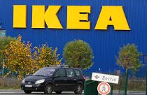 A car drives past the IKEA store in Plaisir, west of Paris, Nov. 20, 2013.