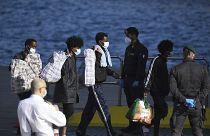 Migranti sbarcati a Lampedusa. 