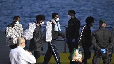 Migranti sbarcati a Lampedusa. 