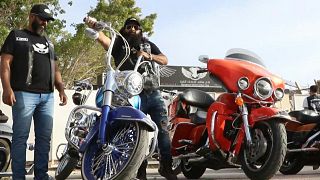 The motorbikes gleam as they parade through Benghazi's streets