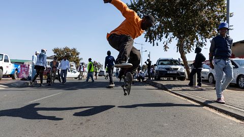 A skater performs a trick during a skaters gathering to celebrate Youth Day in Soweto, Johannesburg.