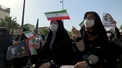 Supporters of Raisi stage campaign rally in Tehran