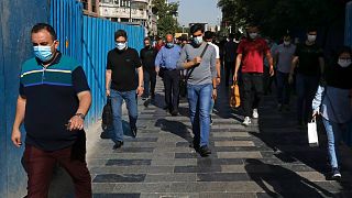 People start their day at the Grand Bazaar, in Tehran, Iran, Thursday, June 3, 2021.