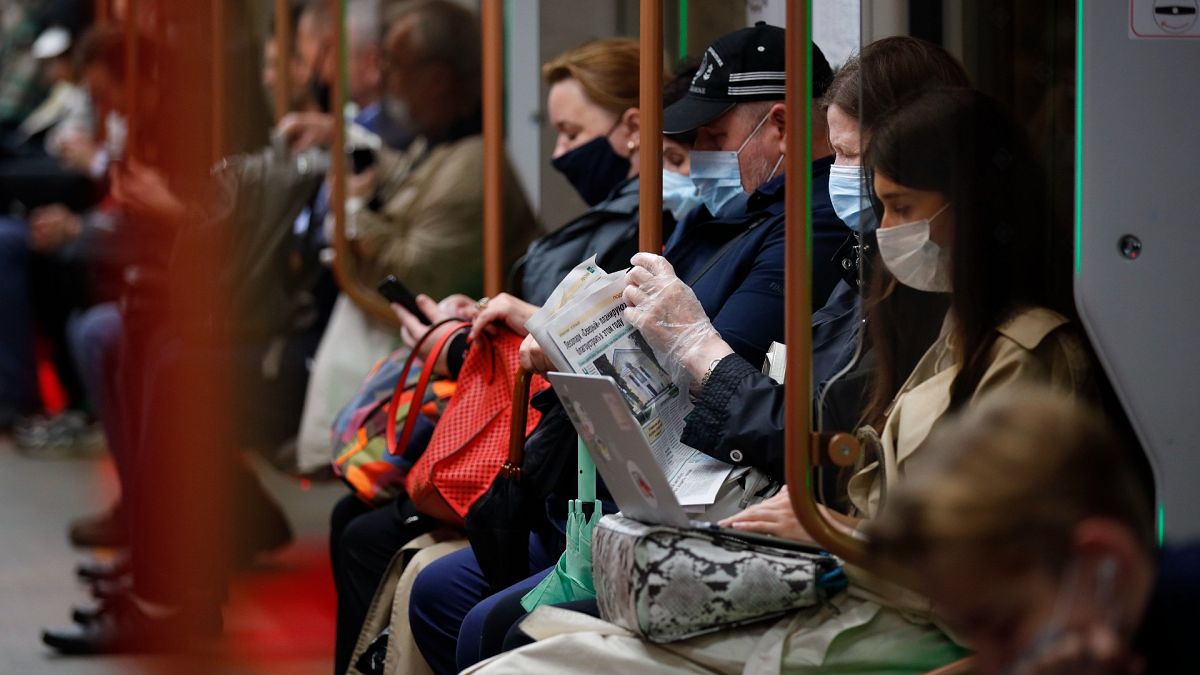 People wearing face mask to help curb the spread of the coronavirus ride the underground in Moscow, Russia June 10, 2021.