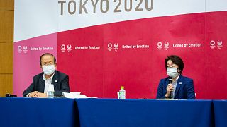 Tokyo 2020 CEO Toshiro Muto, left, and President Seiko Hashimoto attend a news conference on June  June 18, 2021.