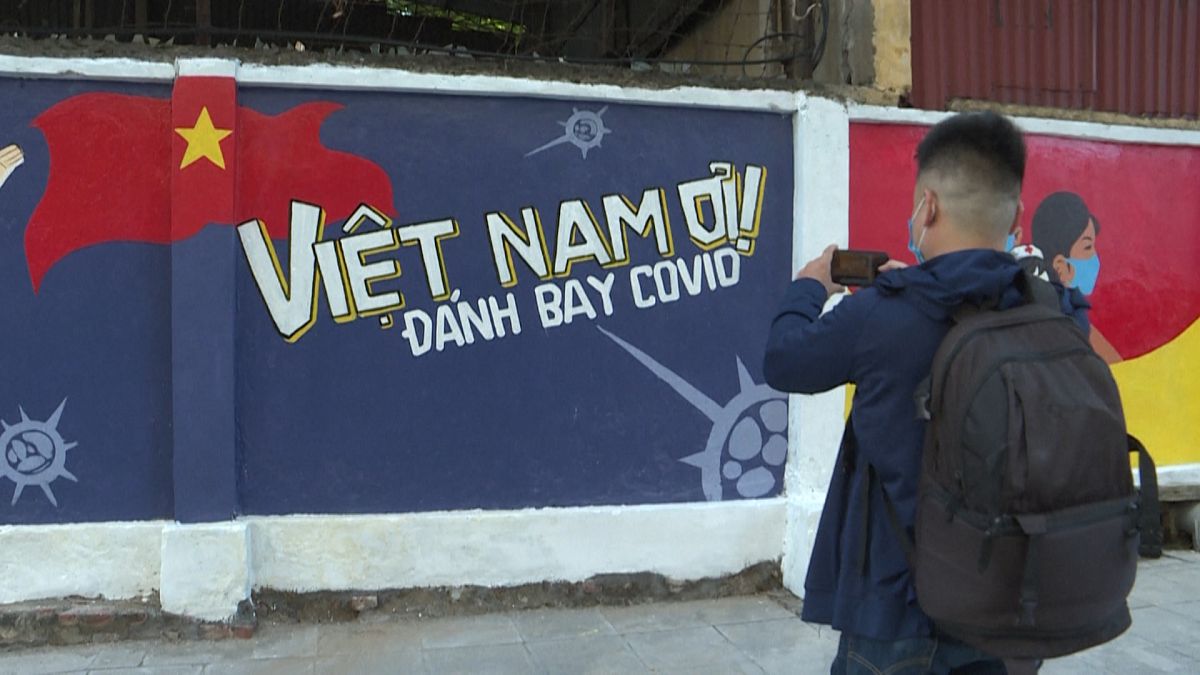 Murals on COVID-19 prevention hit Hanoi street