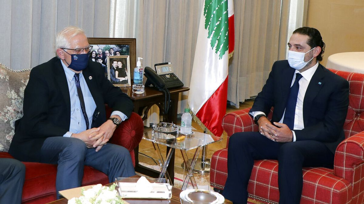 The EU's top diplomat Josep Borrell, right, meets with prime minister-designate Saad Hariri in Beirut on Saturday