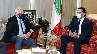 The EU's top diplomat Josep Borrell, right, meets with prime minister-designate Saad Hariri in Beirut on Saturday