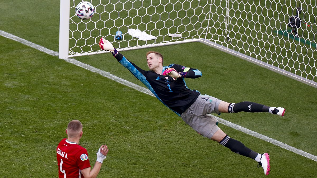 Peter Gulacsi deflects a shot away from goal during the Euro 2020 group F match between Hungary and France at the Ferenc Puskas stadium in Budapest, Hungary, June 19, 2021. 