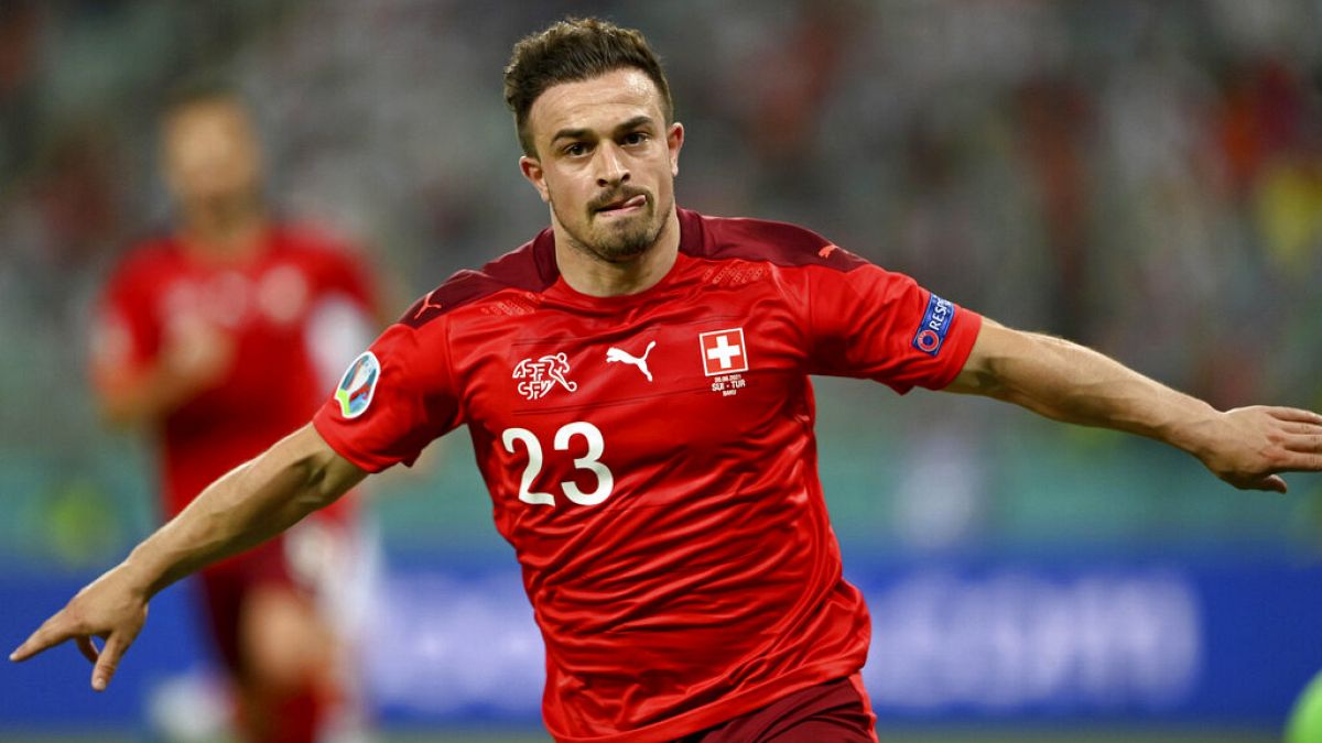 Switzerland's Xherdan Shaqiri celebrates scoring his side's third goal against Turkey on Sunday
