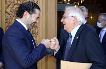Lebanese Prime Minister-Designate Saad Hariri, left, greets European Union foreign policy chief Josep Borrell in Beirut on Saturday