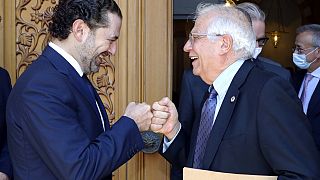 Lebanese Prime Minister-Designate Saad Hariri, left, greets European Union foreign policy chief Josep Borrell in Beirut on Saturday