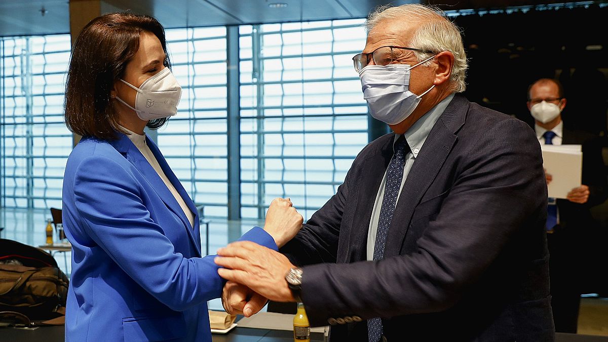 European Union foreign policy chief Josep Borrell, right, greets Belarusian opposition politician Sviatlana Tsikhanouskaya during a European Foreign Affairs Ministers meeting.