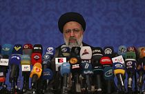 FILE: Iran's new President-elect Ebrahim Raisi speaks during a press conference in Tehran, Iran, Monday, June 21, 2021.