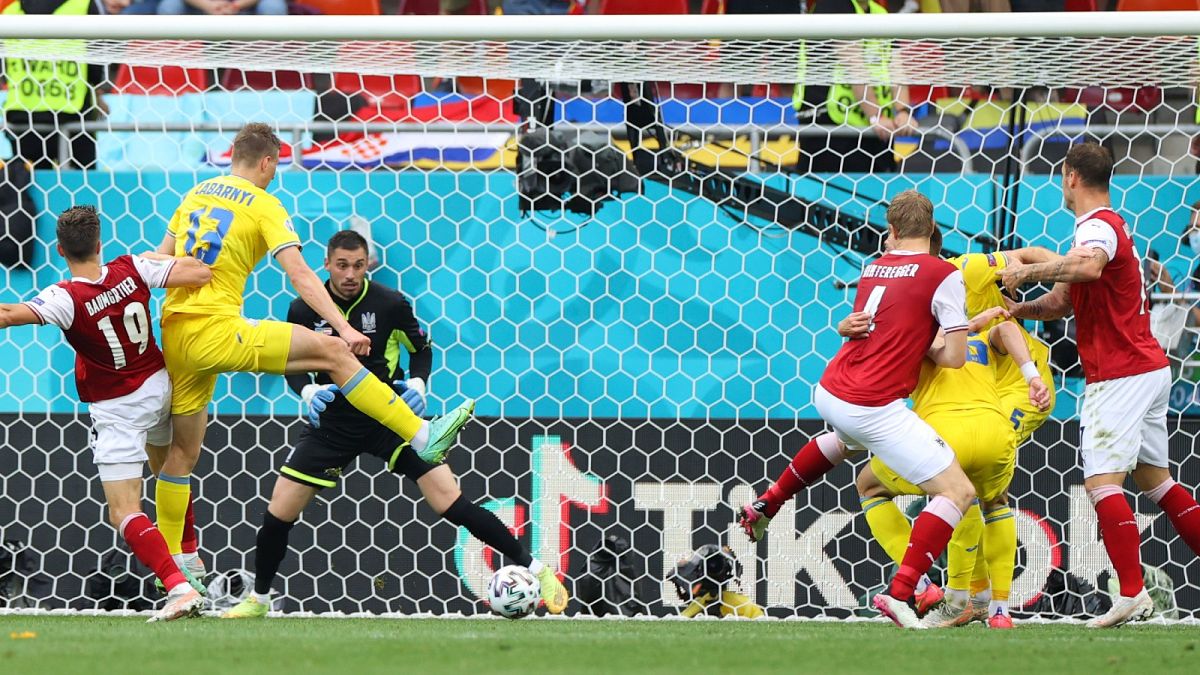 Austria's Christoph Baumgartner (19) scores his side's opening goal during the Euro 2020 group C match against Ukraine in Bucharest, Monday, June 21, 2021
