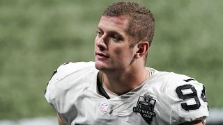 Las Vegas Raiders defensive end Carl Nassib leaves the field after an NFL football game against the Atlanta Falcons in Atlanta on Nov. 29, 2020.