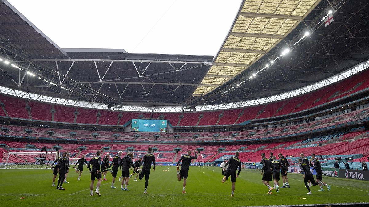 Czech players warm up during a team training session at Wembley stadium in London, June 22, 2021 .
