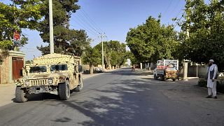 An Afghan army Humvee patrols in Kunduz city, north of Kabul, Afghanistan.