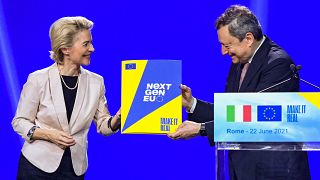 European Commission President, Ursula von der Leyen (L) symbolically hands to Italy's Prime Minister, Mario Draghi the NextGenerationEU recovery plan, on June 22, 2021 in Rome