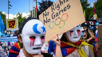 Dozens of Uighurs, Tibetans protest the Beijing 2022 Winter Olympics