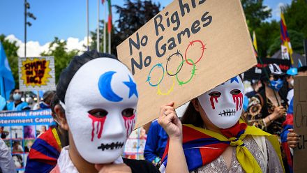 Dozens of Uighurs, Tibetans protest the Beijing 2022 Winter Olympics