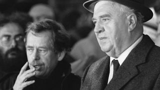 In this Nov. 26, 1989 file photo the last Czechoslovak communist prime minister Ladislav Adamec, right, attends a demonstration during the so-called Velvet Revolution 