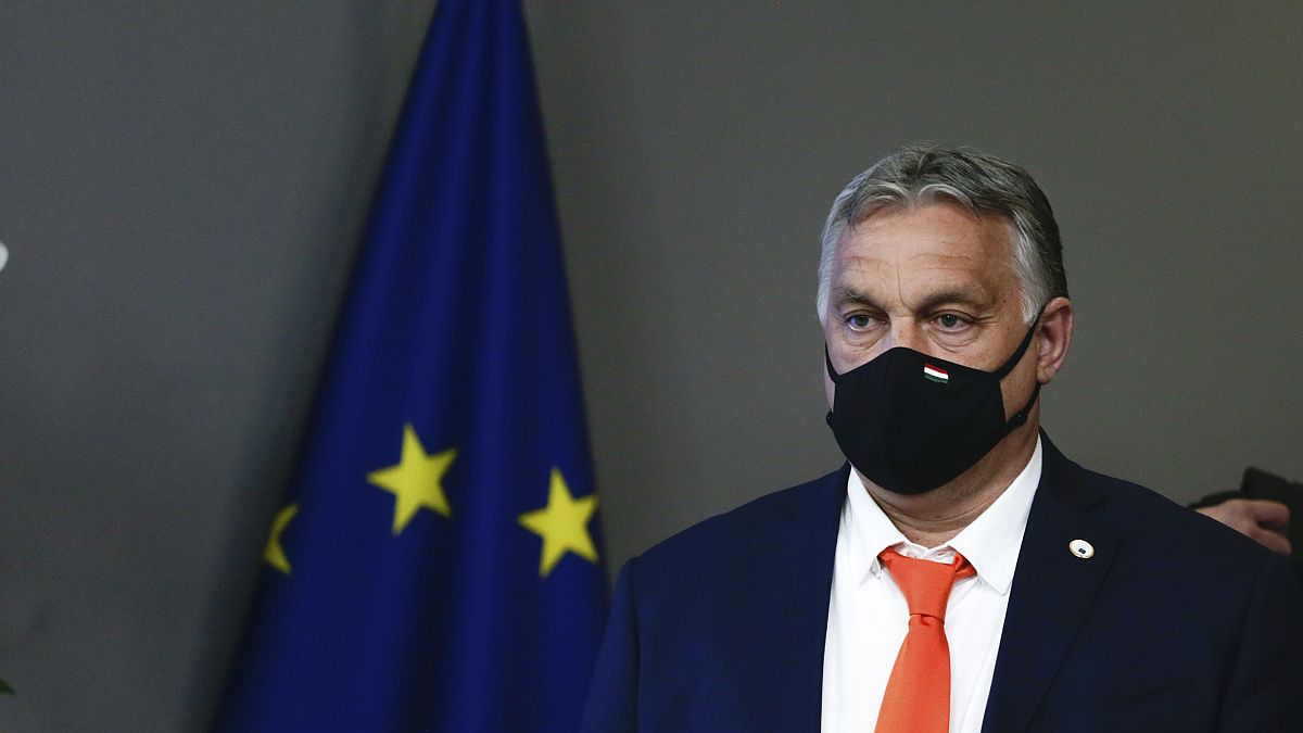 Hungary's Prime Minister Viktor Orban leaves at the end of the first day of an EU summit at the European Council