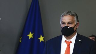 Hungary's Prime Minister Viktor Orban leaves at the end of the first day of an EU summit at the European Council