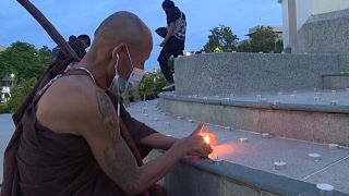 Thai protesters hold candlelight vigil to mark Siamese Revolution anniversary