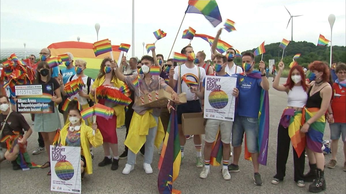 Some fans hold rainbow flags upon arriving at Munich`s Arena ahead of Germany - Hungary match 