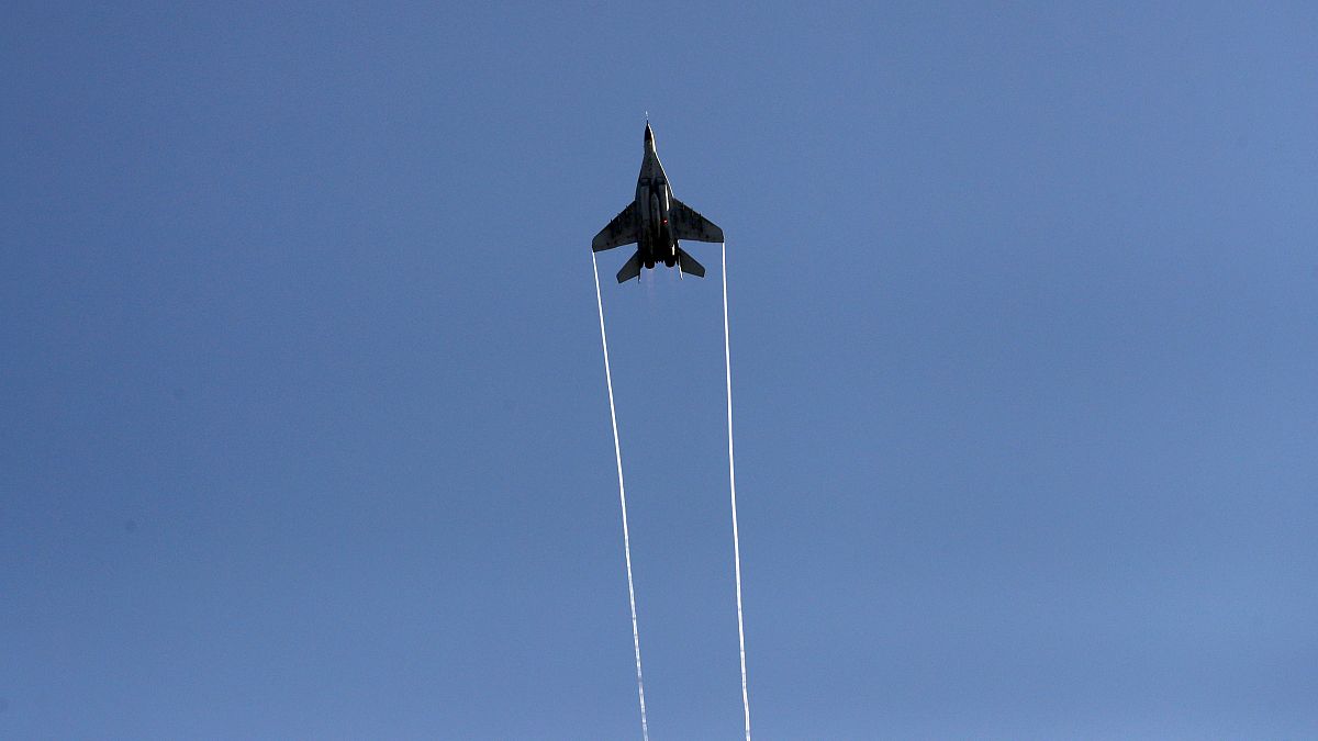 A Serbian Army MiG-29 jet fighter performs over Batajnica during military exercises.
