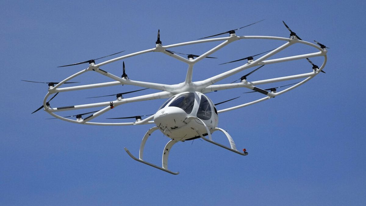 Urban air taxi 'Velocity' produced by company Volocopter makes a test flight during an event at the Air and Space Museum in Le Bourget, east of Paris, Monday, June 21, 2020.