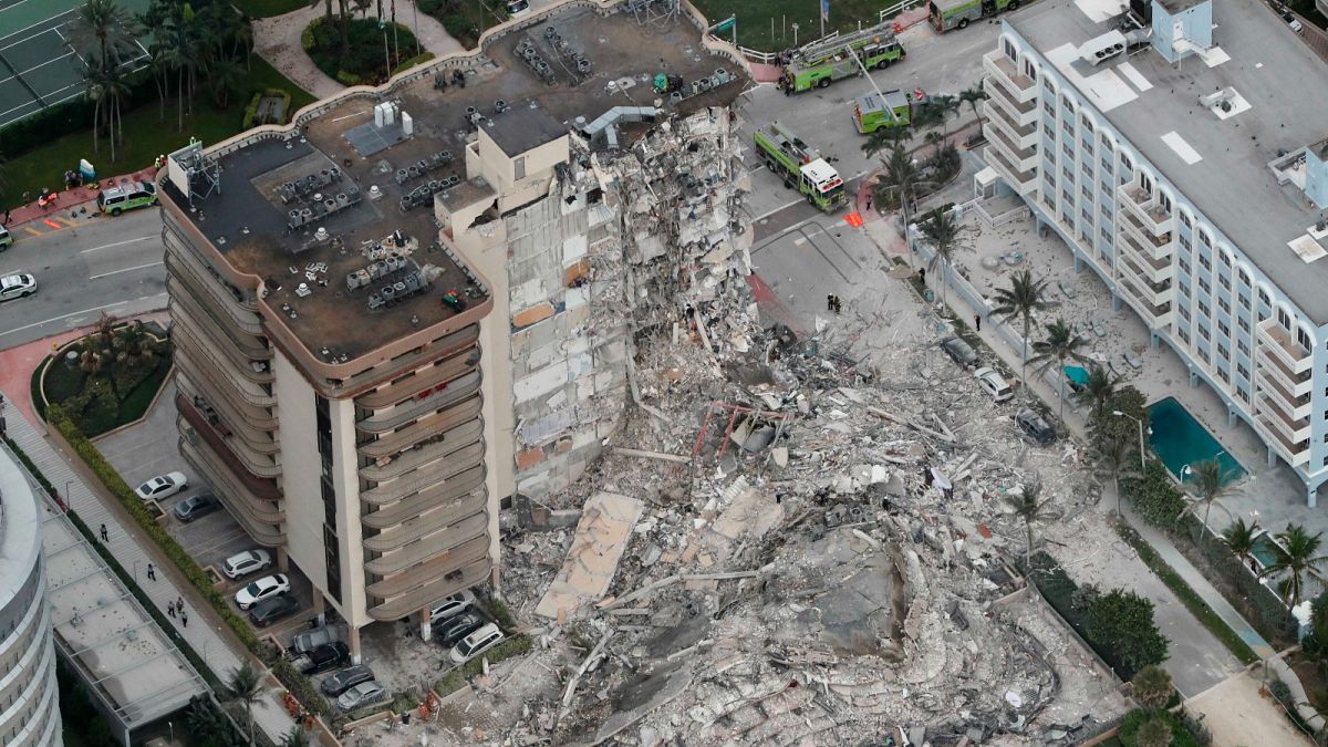 This aerial photo shows part of the 12-story oceanfront Champlain Towers South Condo that collapsed early Thursday, June 24, 2021 in Surfside, Florida, U.S.